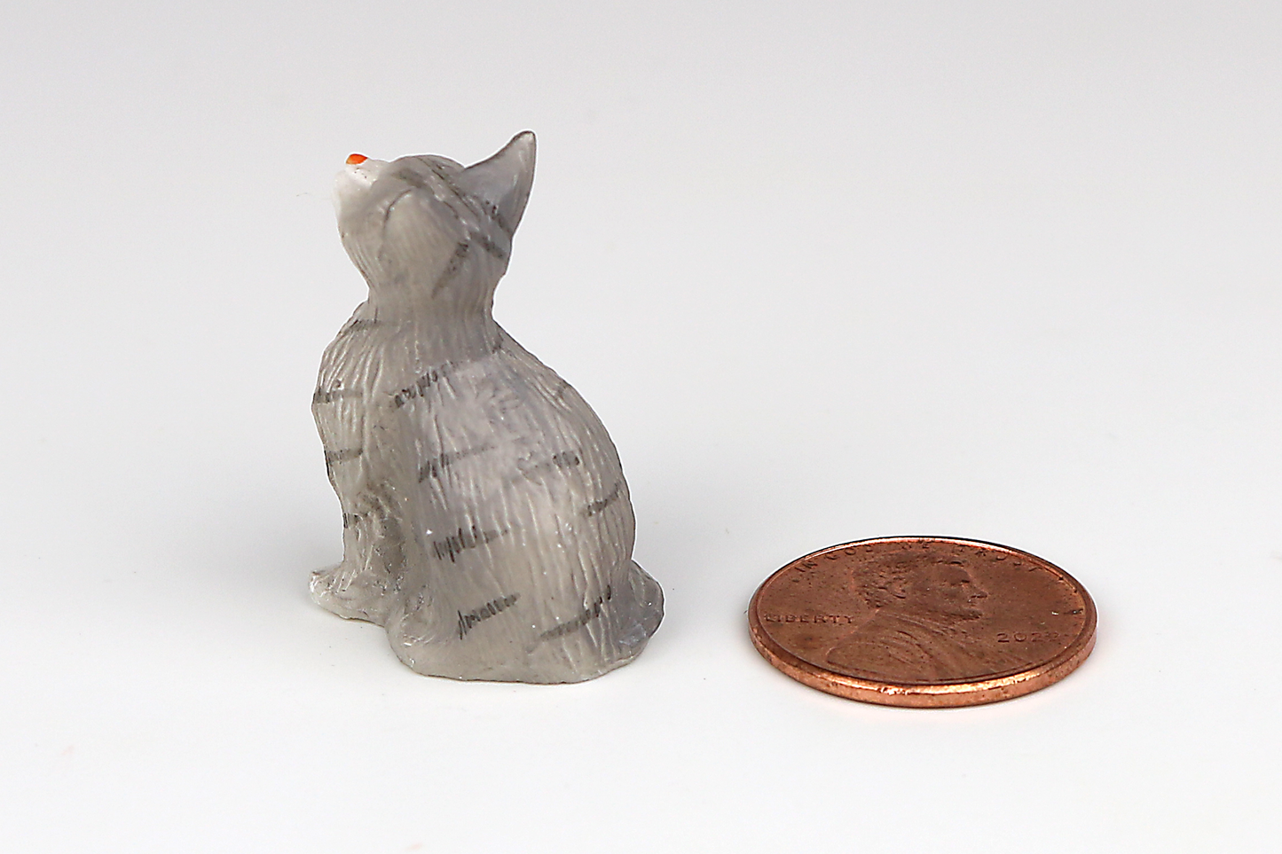 Sitting Gray Cat with Eyes Closed