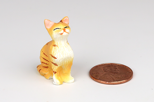 Sitting Orange Cat with Eyes Closed