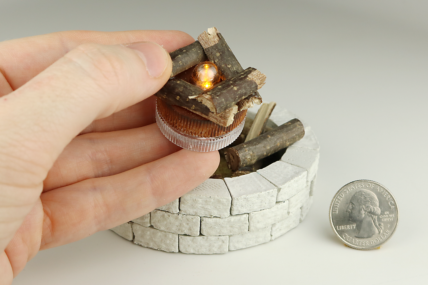 Stone Fire Pit with Light-Up Flame
