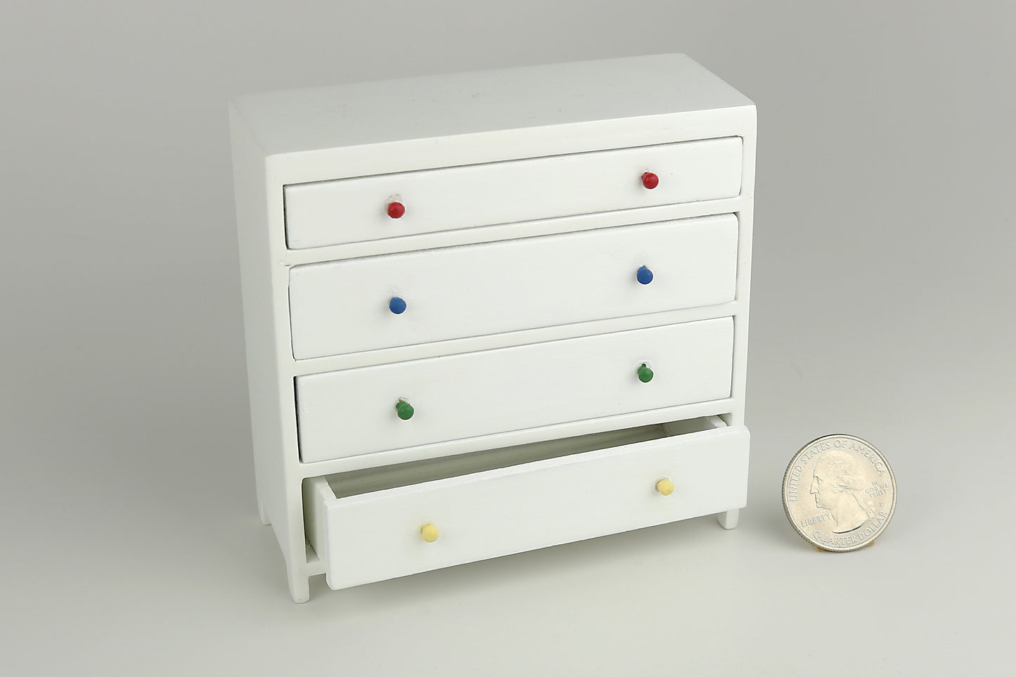White Dresser with Rainbow Handles
