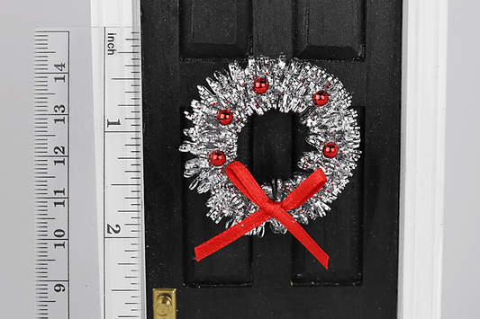 Silver Tinsel Wreath with Red Ornaments