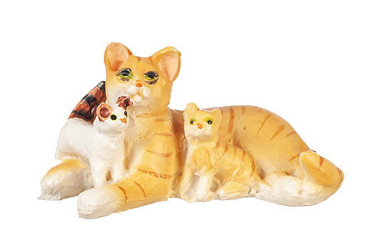Orange and white tabby cat figurine cuddling with two kittens, one white with black and orange ears and tail, and another orange and white tabby, on a white background