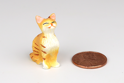 Sitting Orange Cat with Eyes Closed