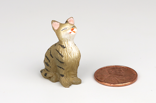 Sitting Tabby Cat with Eyes Closed