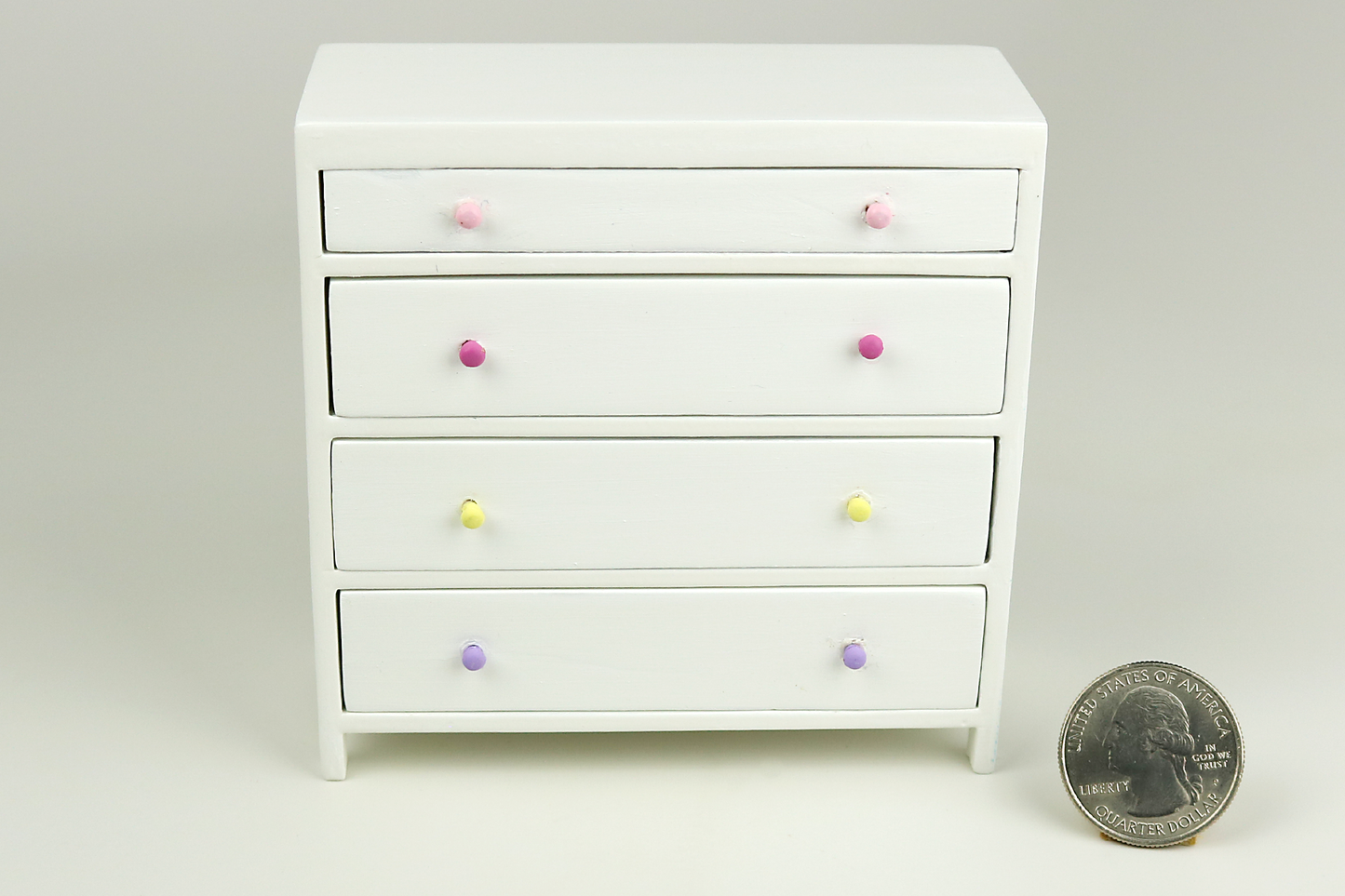 White Dresser with Rainbow Handles