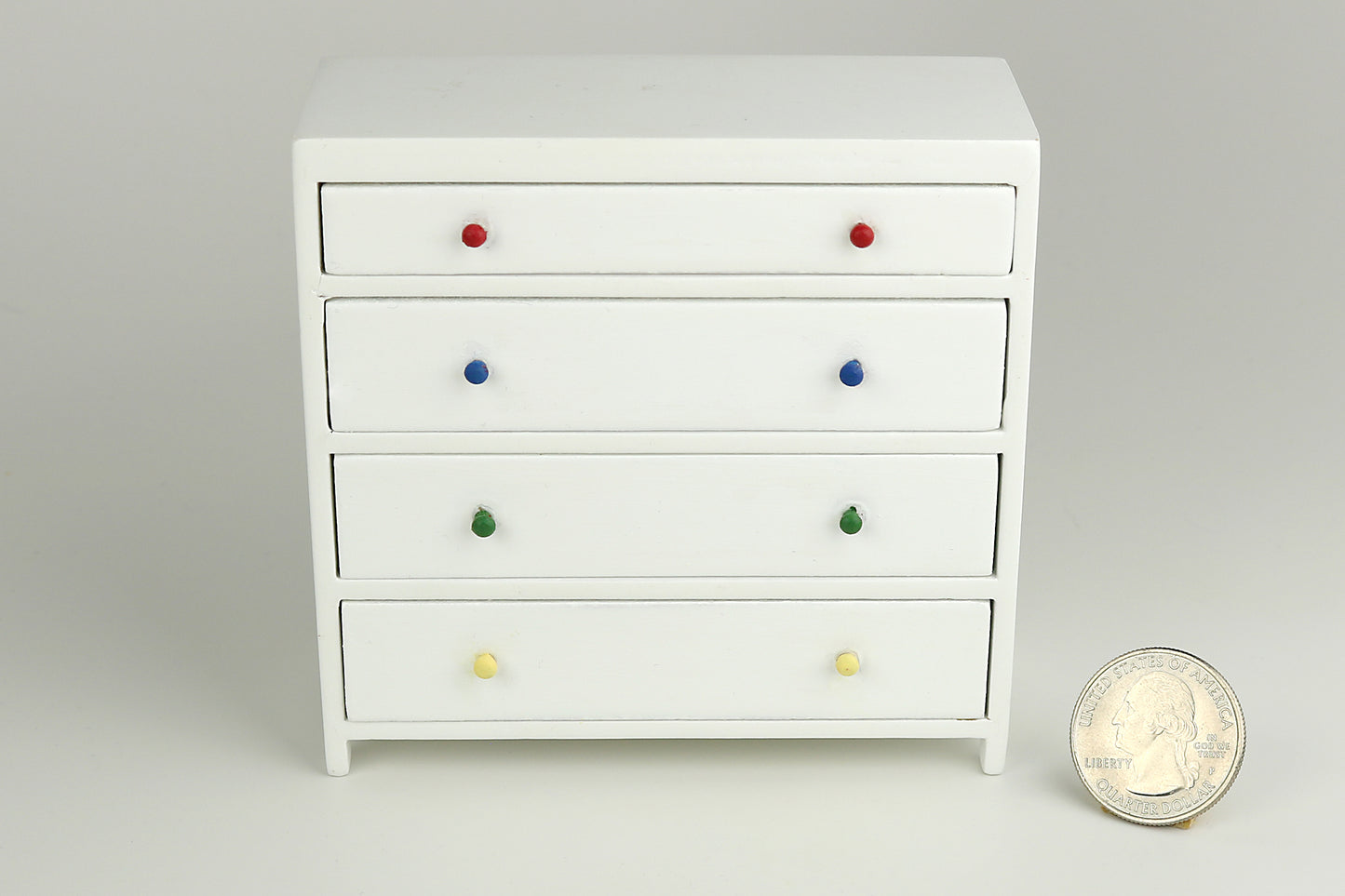 White Dresser with Rainbow Handles