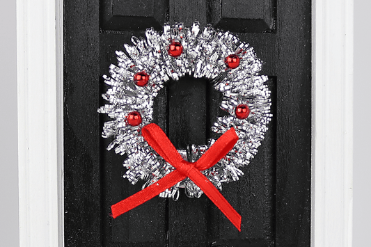 Silver Tinsel Wreath with Red Ornaments